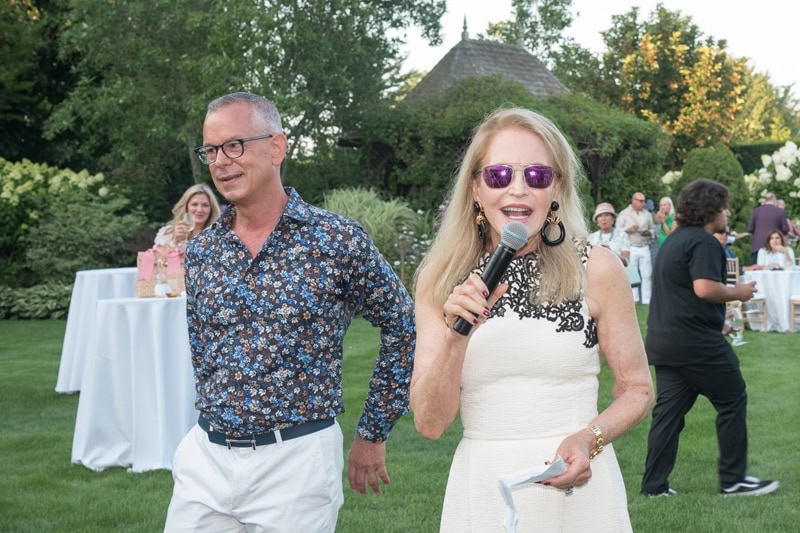 Jim-Berkrot-and-Carole-Guest-speaking-with-guests