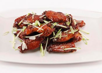 Score A Touchdown In The Kitchen This Super Bowl With Bourbon Apple Glazed Chicken Wings