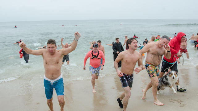 Nearly 400 Plungers Dash Into The Atlantic Ocean During Heart Of The
