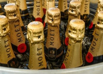 Kim Kardashian West Wows At Hamptons Party In Beige Body-Hugging Dress