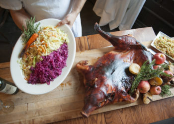 The 22nd Annual Christmas Eve Suckling Pig Roast at Almond