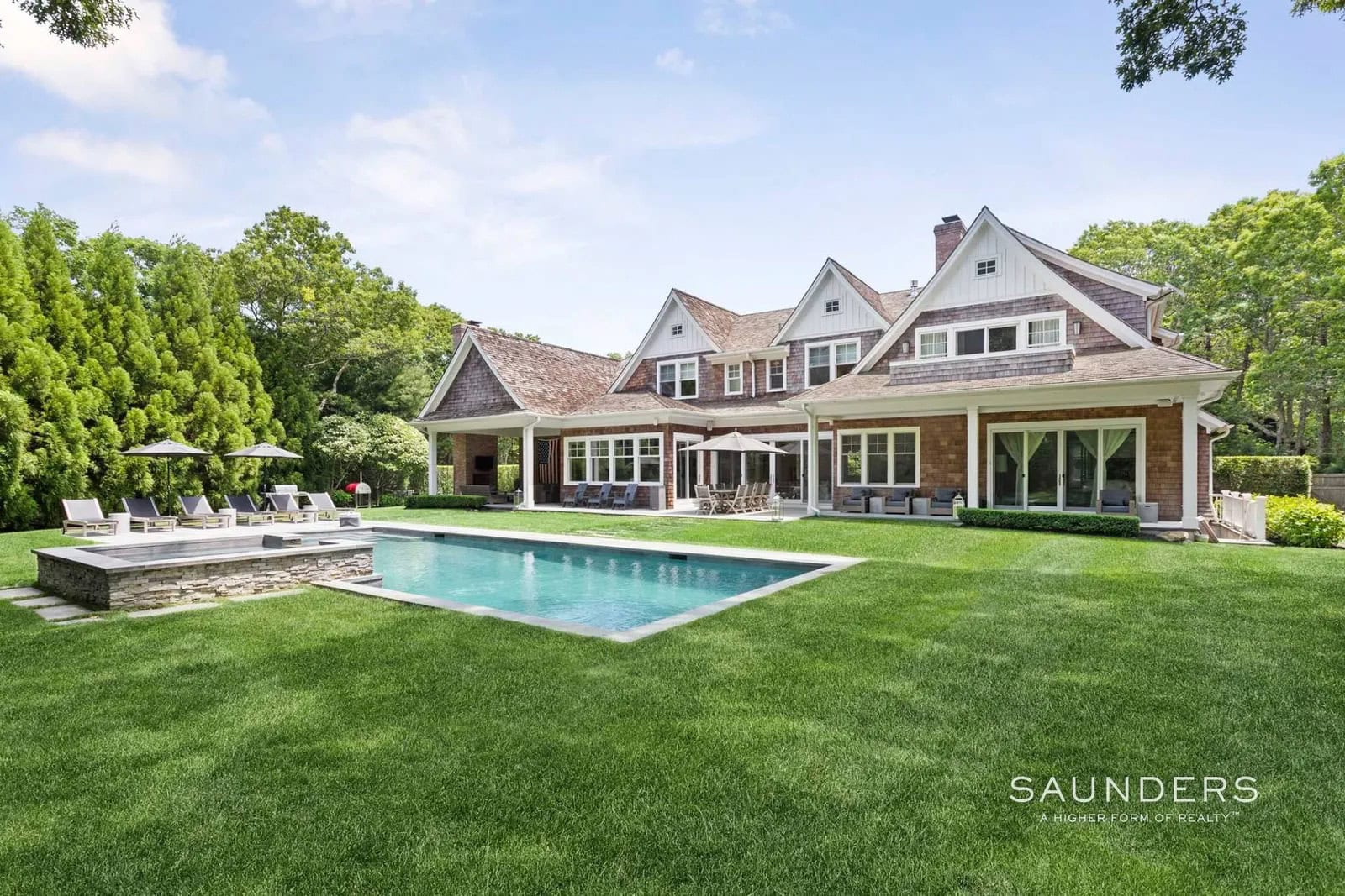 Enter through a dramatic double-height foyer into the refined living space of this six-bedroom, seven-and-a-half-bath home with 8,419+/- sq. ft. over three levels. Impeccably maintained with oak floors, detailed millwork, Marvin windows throughout, and fully integrated smart home technology, the home presents in pristine, like-new condition.