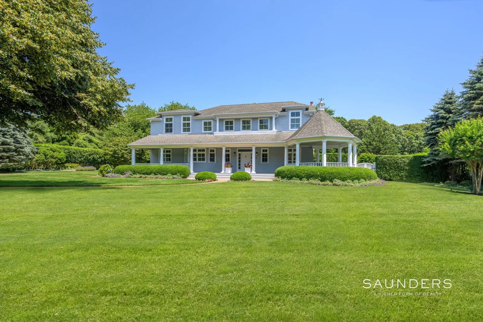 Surrounded by distinguished estate-like properties, this meticulously curated elegant residence offers the quintessential Hamptons lifestyle. Characterized by timeless shingle-style architecture and pristine, professionally designed grounds, spanning 1.35 acres of absolute privacy. Freshly painted in June 2026 from its classic cedar shingles to its expansive trim, the property radiates a commanding curb appeal, framed by thousands of dollars in specimen trees-including mature Japanese maples, dogwoods, and vibrant crepe myrtles.