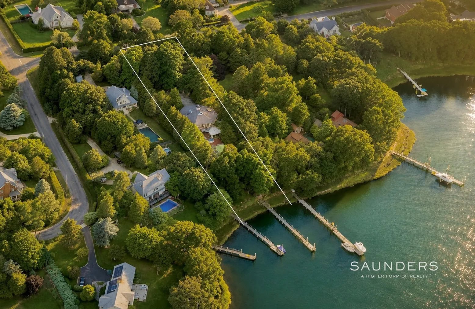 Few places are better suited to an octagonal home than Shelter Island, particularly at 15 Dickerson Drive on Menantic Creek. Every viewpoint reaches outward toward the landscape, framing the water and sky, while the interiors turn inward, creating a warm, communal focal point for gathering with the people who matter most.